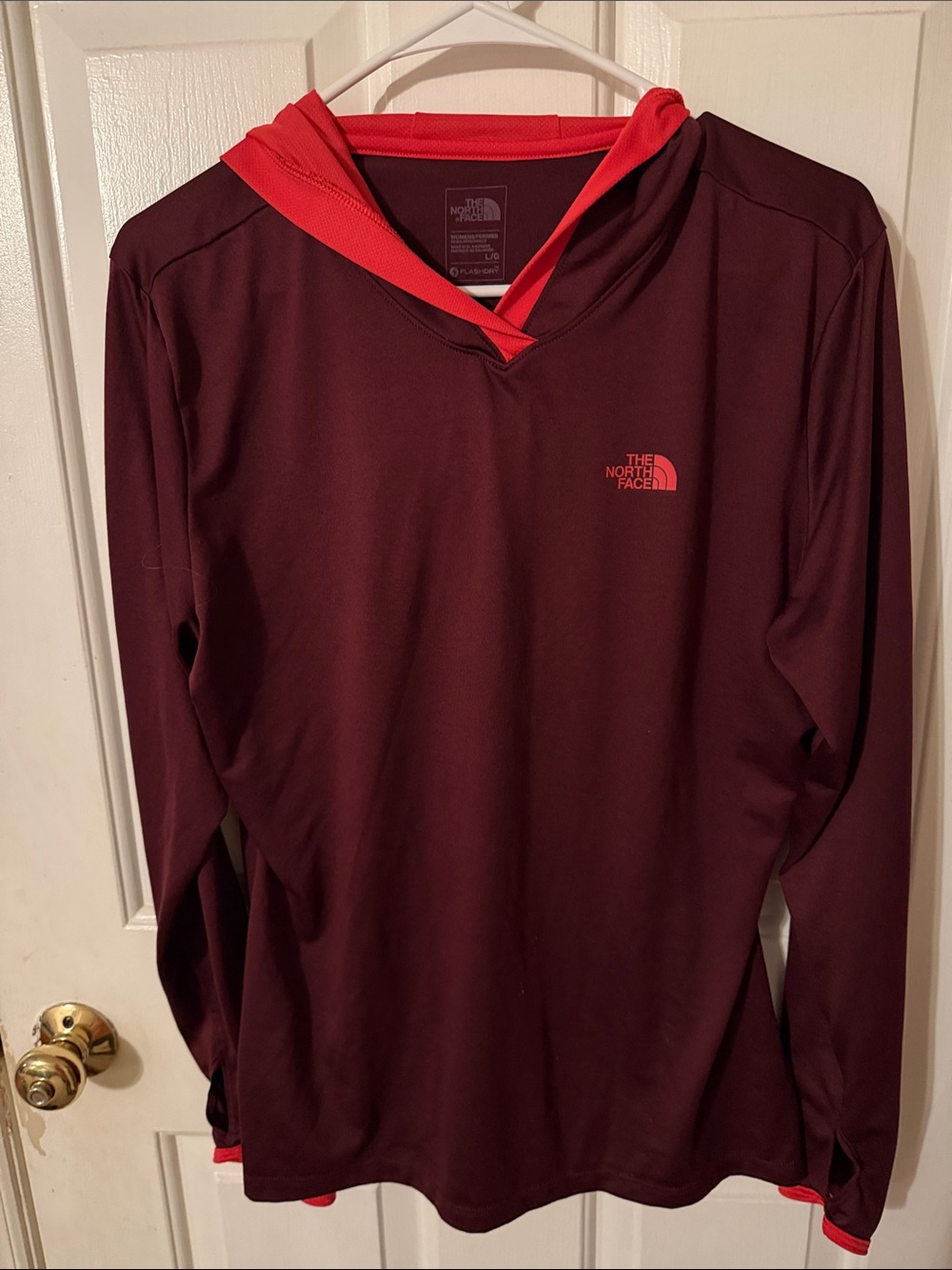 The North Face woman’s  Maroon Crewneck Hoodie with Coral Trim